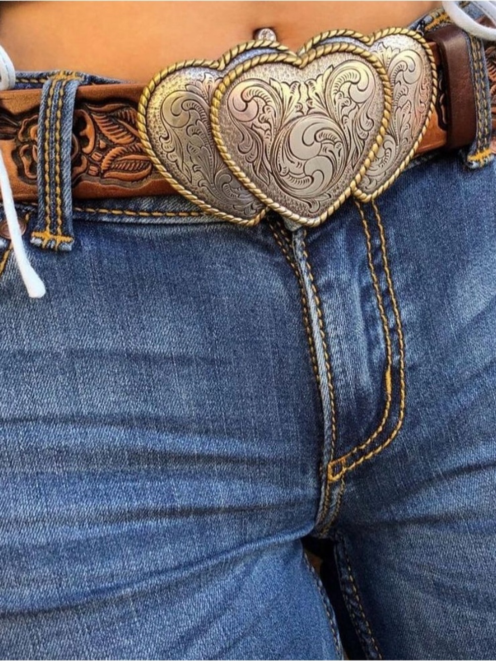 Woman's heart shaped cowgirl belt.